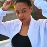 woman in white long sleeve shirt